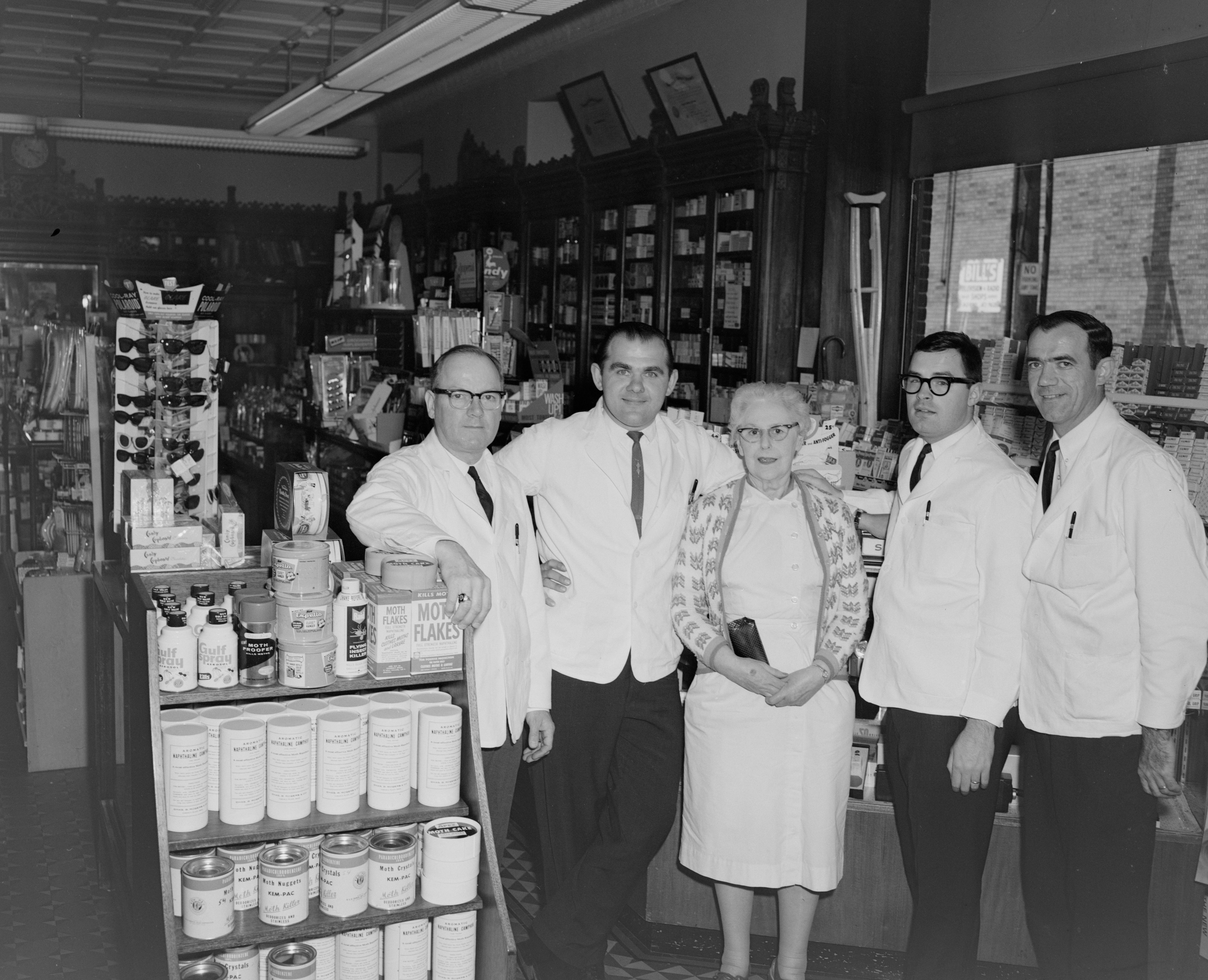 DM Sphere Pharmacy team and storefront